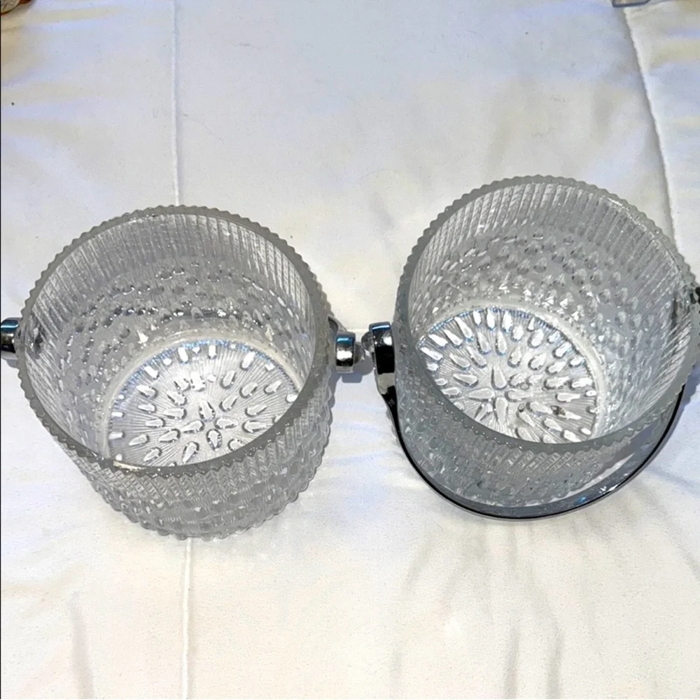 Set of two texture glass ice buckets or votive holders with chrome handles. 2